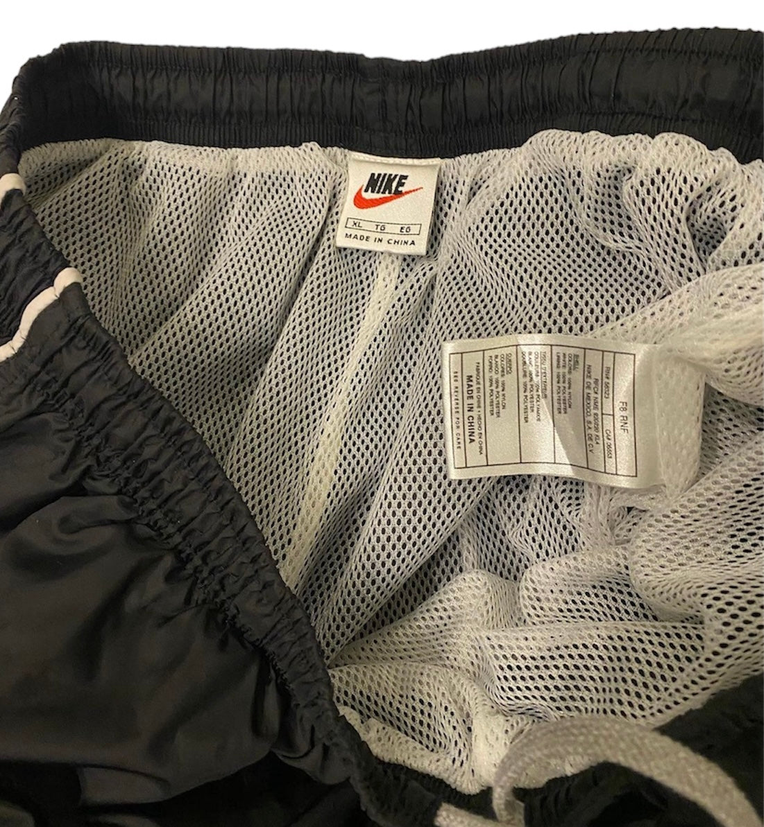 Vintage Nike tracksuit pants with ankle logo and zippers